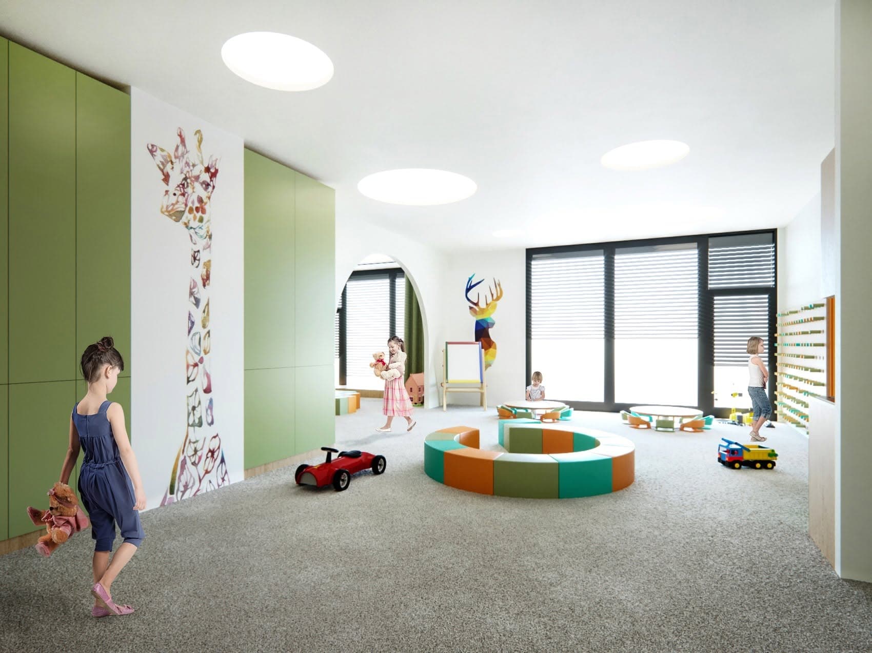 Open play space with circular skylights and soft green storage