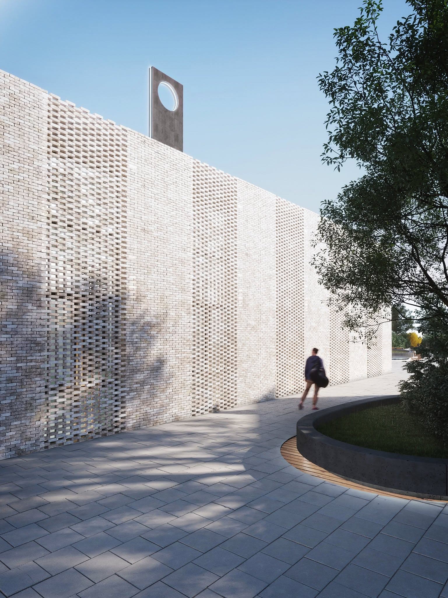 Filtered daylight across the open-brick facade