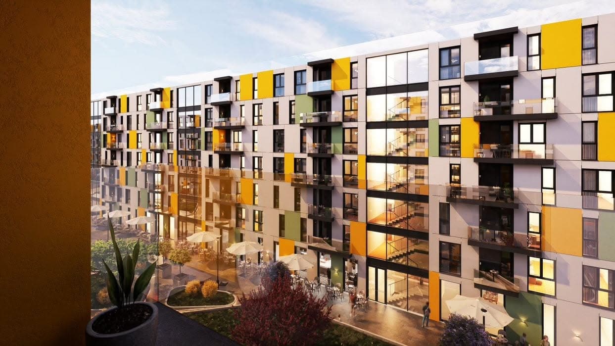 View from a residential balcony into the shared courtyard